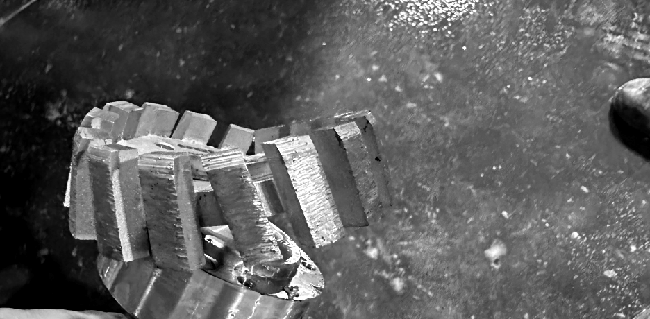 CNC tool on a wet stone edge